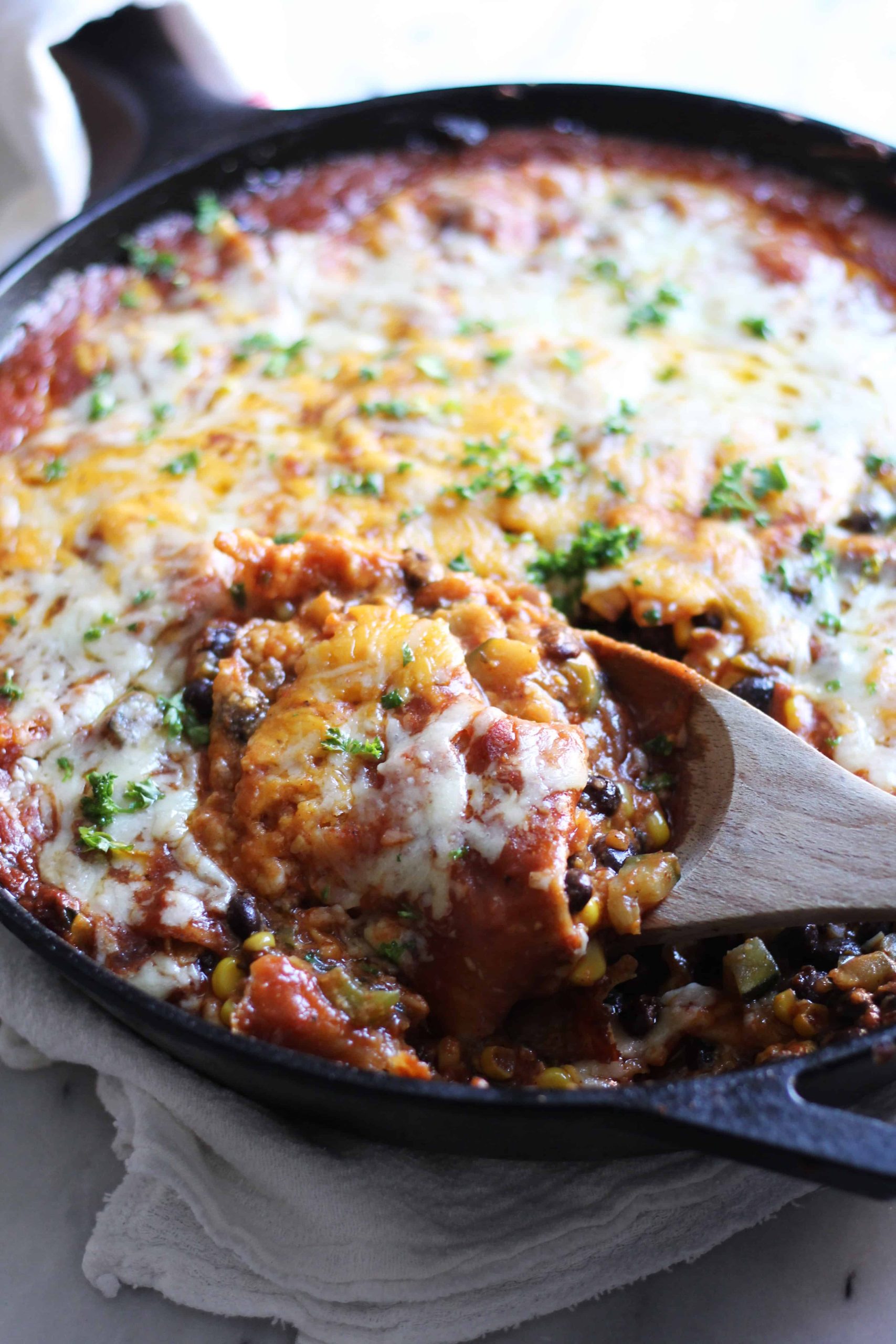 One-Skillet Cheesy Enchilada Bake - The Baker Chick